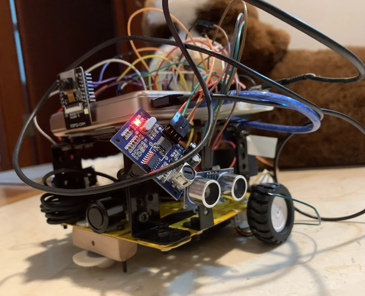 The finished CANIS robot with ESP32 and ultrasonic sensors